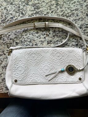 The Sak White Embossed Leather Crossbody with Tassel Charm